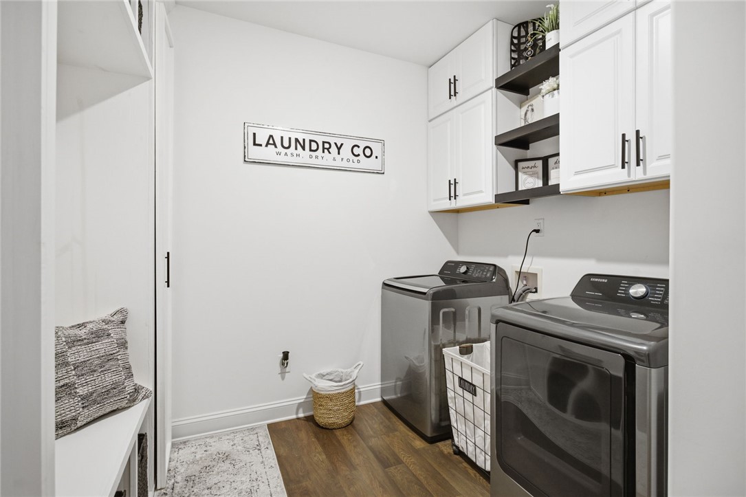 525 16th Circle Walhalla, SC 29691 - Photo 14 of 50 This dedicated laundry room features modern appliances and ample storage for streamlined household tasks.