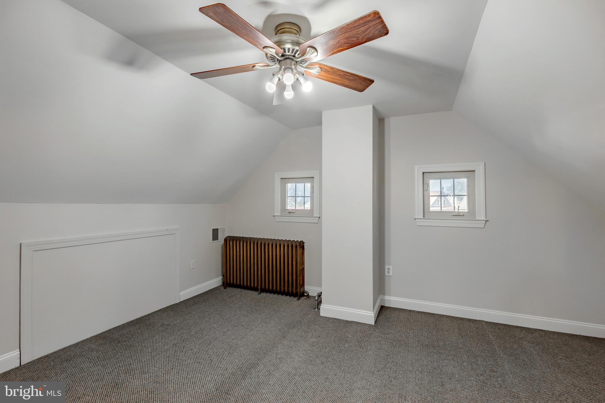 1210 West Darby Road Havertown, PA 19083 - Photo 23 of 33 an empty room with windows and fan