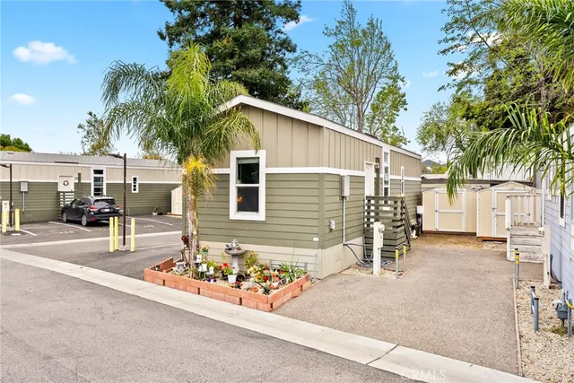 a view of a backyard with a patio