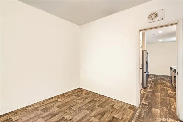 a view of a livingroom with wooden floor
