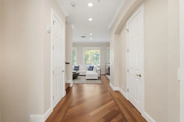 a spacious bedroom with a bed and a couch