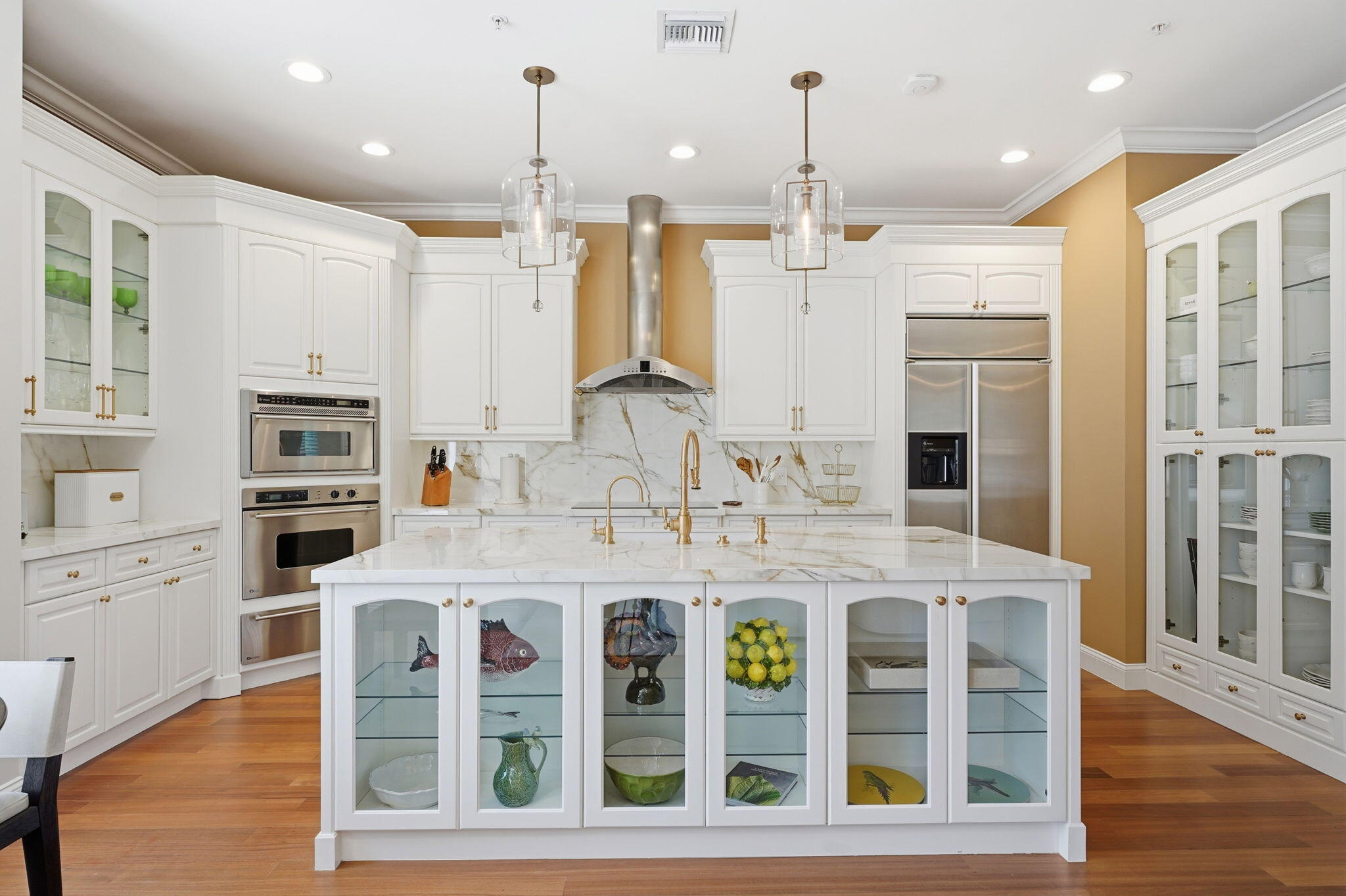 921 Osceola Drive, Unit 2 Boca Raton, FL 33432 - Photo 3 of 69 a large kitchen with stainless steel appliances kitchen island granite countertop a stove a sink and a wooden floors