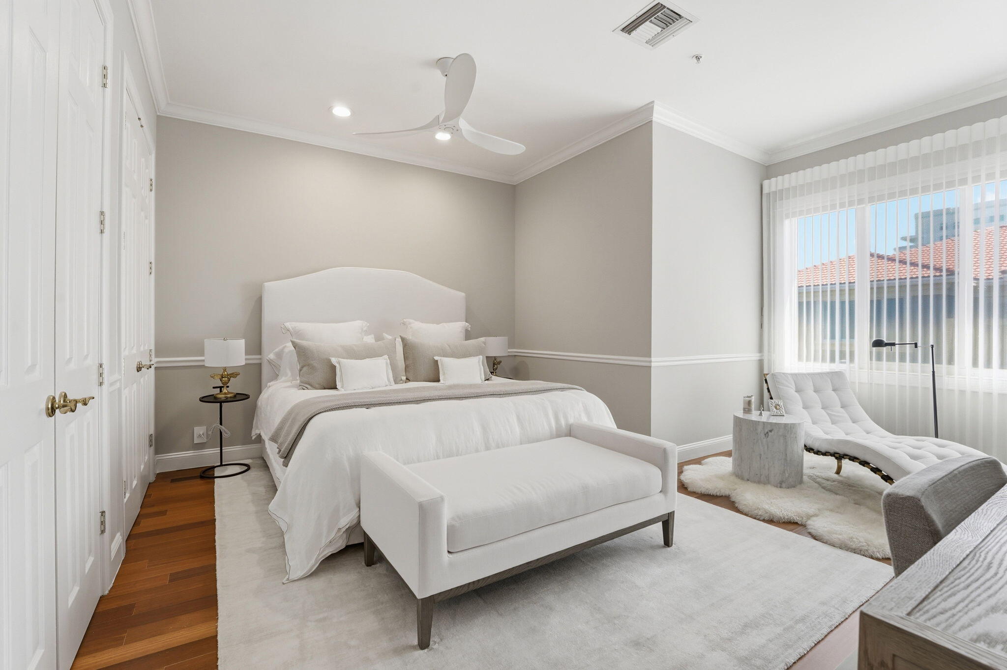 921 Osceola Drive, Unit 2 Boca Raton, FL 33432 - Photo 35 of 69 a bedroom with a bed and a couch