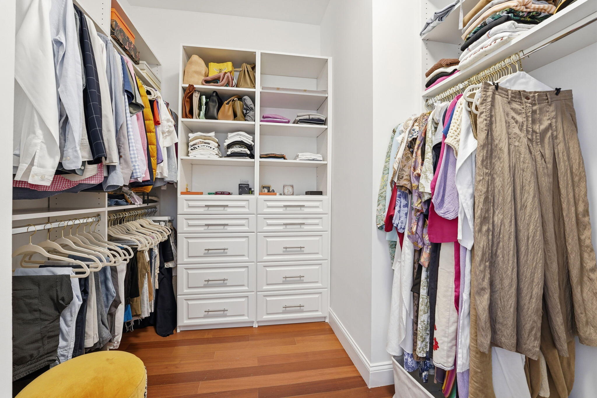 921 Osceola Drive, Unit 2 Boca Raton, FL 33432 - Photo 38 of 69 a view of walk in closet with clothes and shoes