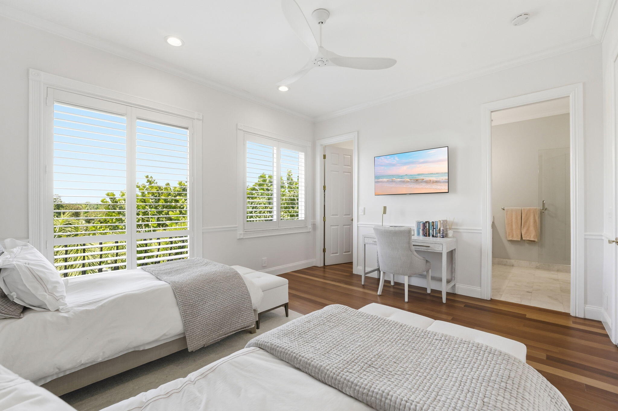 921 Osceola Drive, Unit 2 Boca Raton, FL 33432 - Photo 45 of 69 a bedroom with a bed and a chair