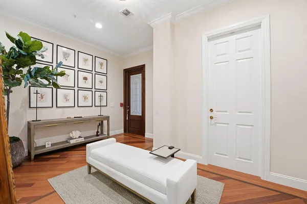 a living room with furniture and a rug
