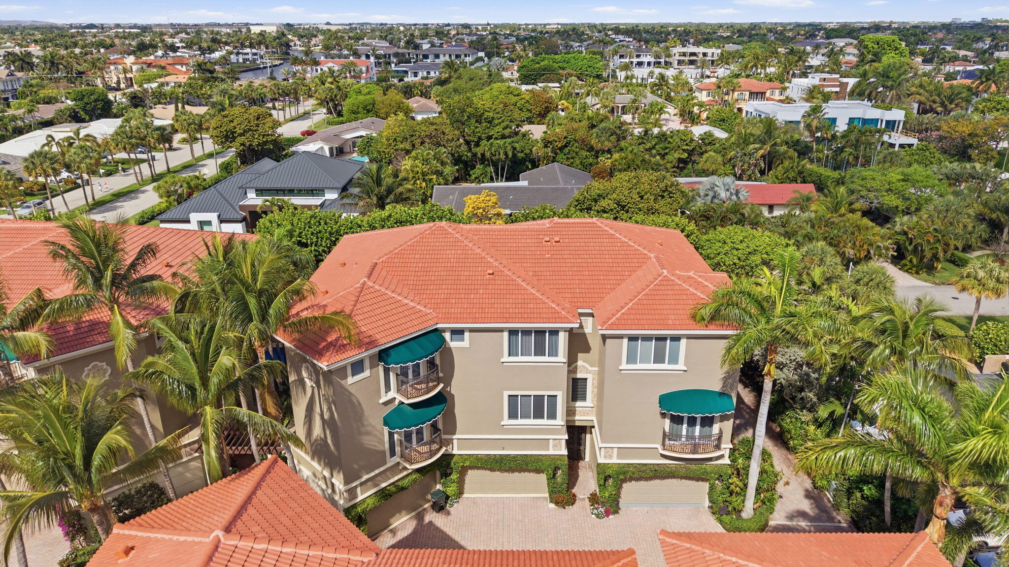 921 Osceola Drive, Unit 2 Boca Raton, FL 33432 - Photo 54 of 69 an aerial view of residential houses with outdoor space and trees