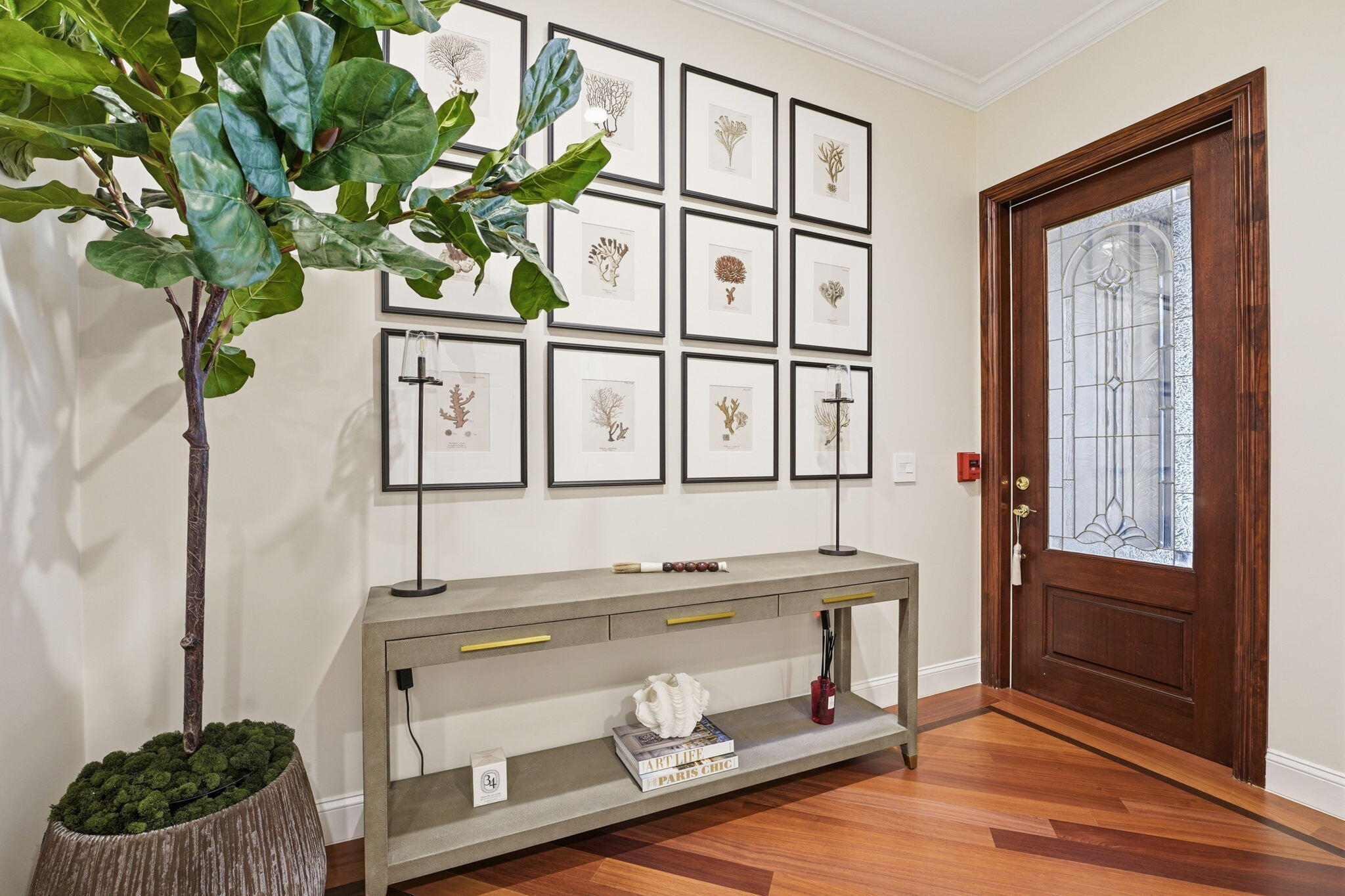 921 Osceola Drive, Unit 2 Boca Raton, FL 33432 - Photo 55 of 69 a vase of flowers sitting on a table