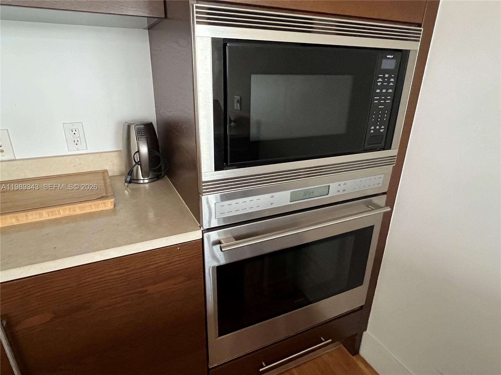 495 Brickell Avenue, Unit 2401 Miami, FL 33131 - Photo 18 of 36 St Steel wall oven & microwave