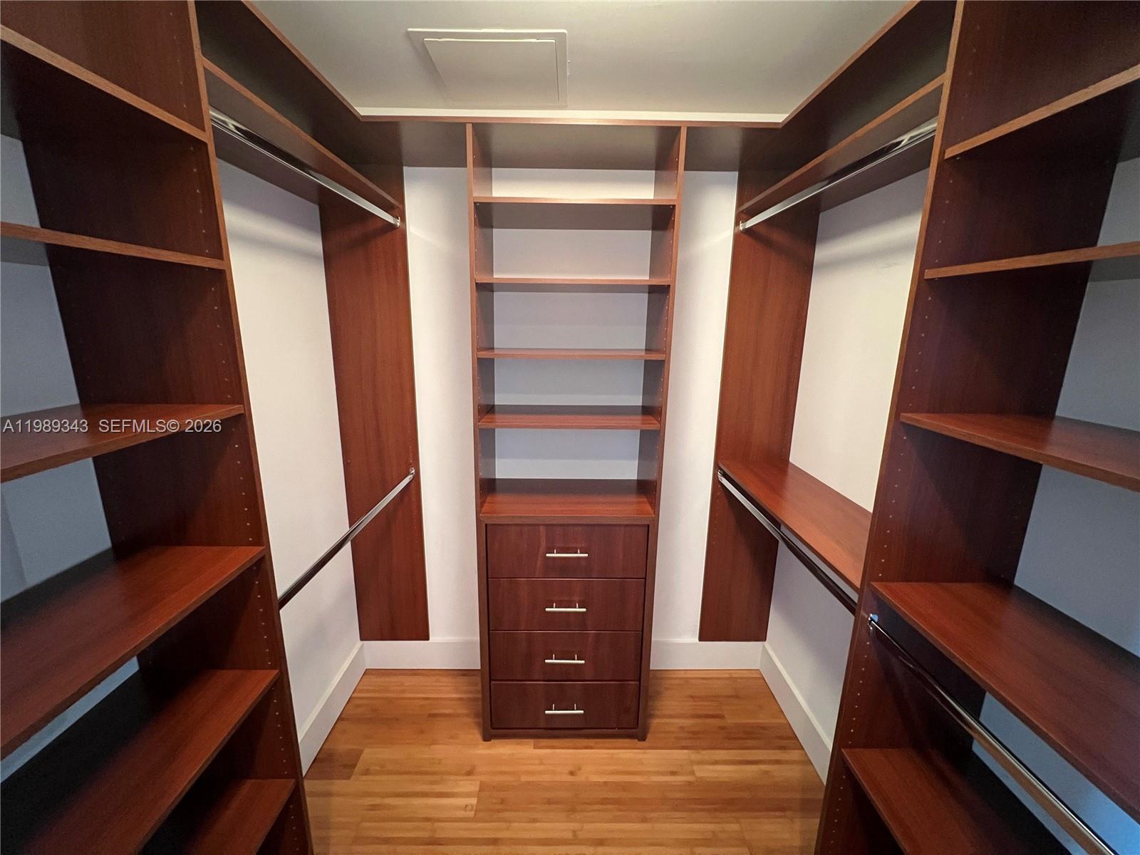 495 Brickell Avenue, Unit 2401 Miami, FL 33131 - Photo 23 of 36 Mst Bdrm HIS Walk-in Closet