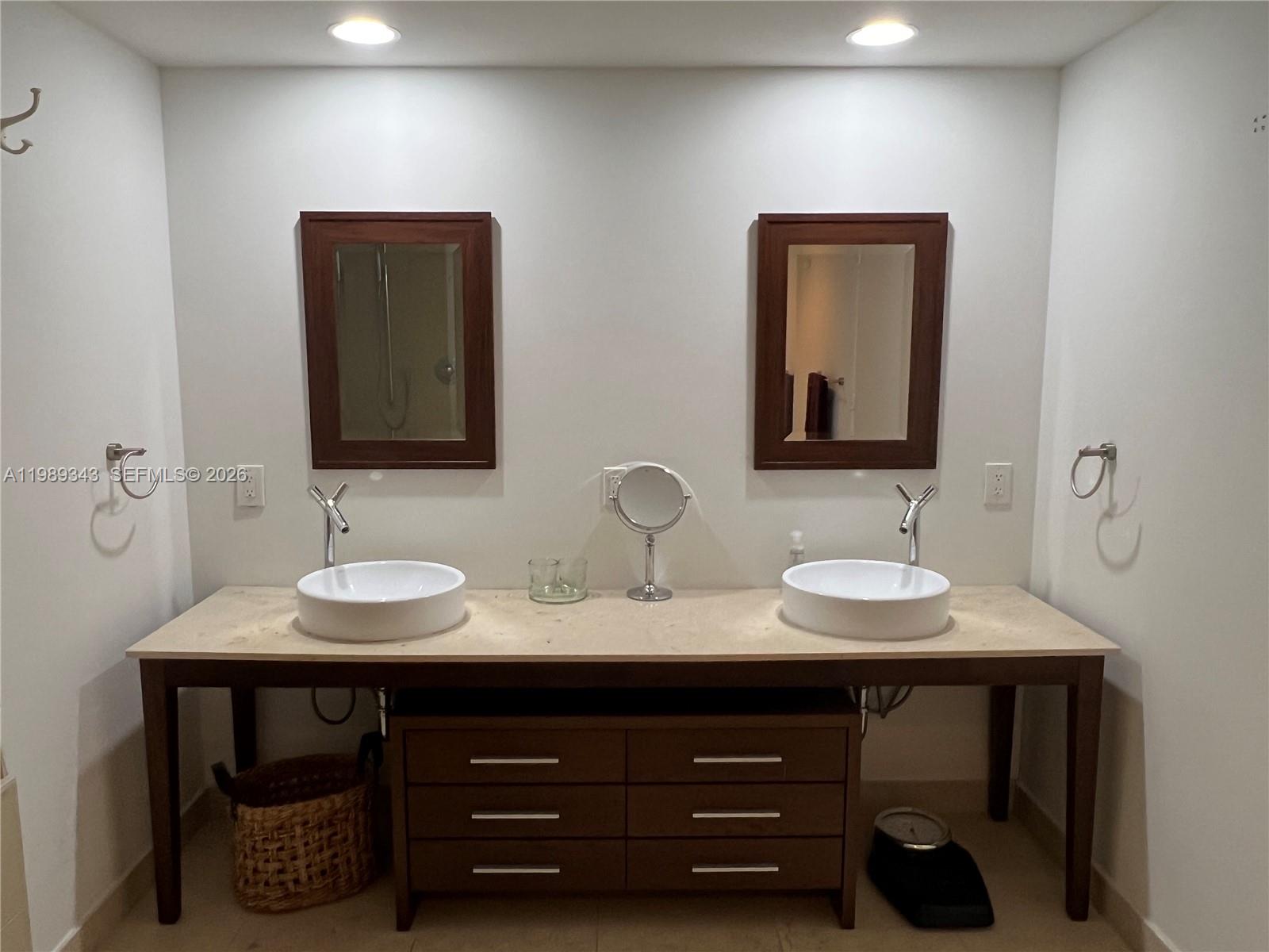 495 Brickell Avenue, Unit 2401 Miami, FL 33131 - Photo 25 of 36 MST BTHRM with dual sinks