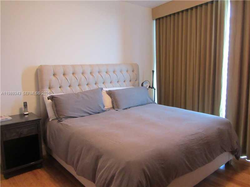495 Brickell Avenue, Unit 2401 Miami, FL 33131 - Photo 30 of 36 2nd Bedroom's linen curtains