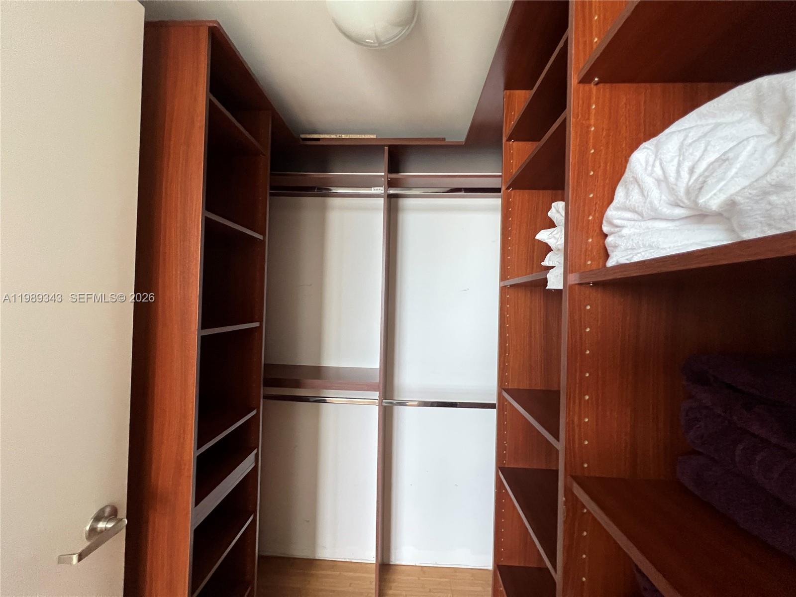 495 Brickell Avenue, Unit 2401 Miami, FL 33131 - Photo 34 of 36 3rd Bedroom's walk-in closet