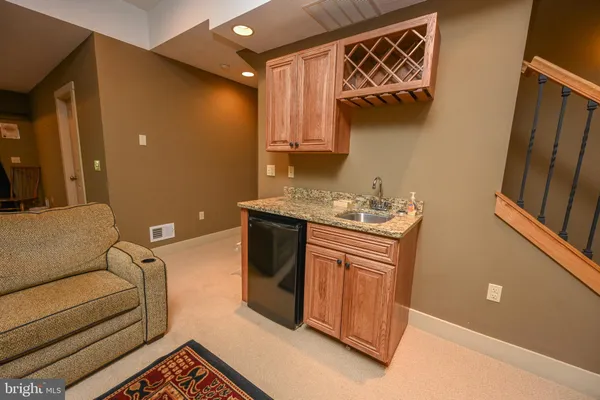 a utility room with a sink a washer and dryer