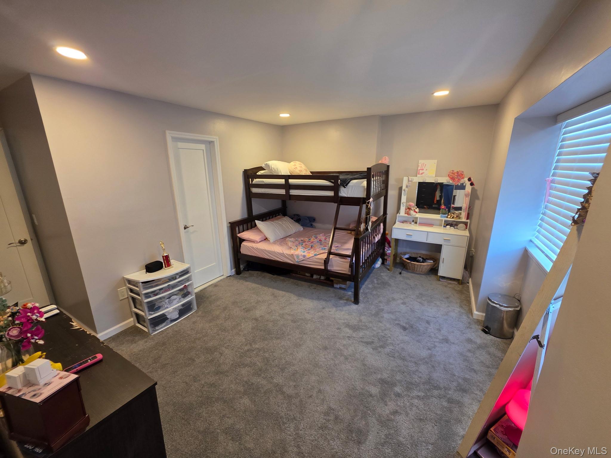 25 Pierces Road, Unit 3 Newburgh, NY 12550 - Photo 13 of 19 a room with furniture and a wooden floor