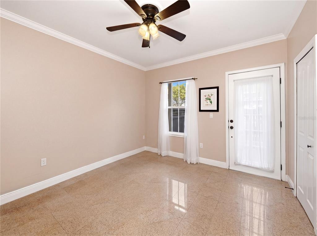 709 Bloom Street, Unit 160 Celebration, FL 34747 - Photo 18 of 35 an empty room with windows and fan