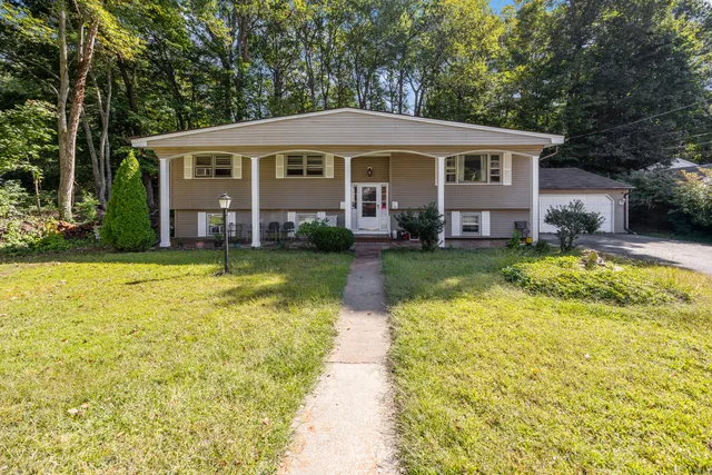 a view of a house with swimming pool