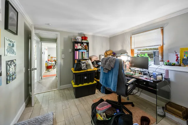 a workspace with furniture and a window