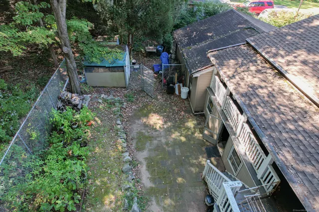 a backyard of a house with lots of green space
