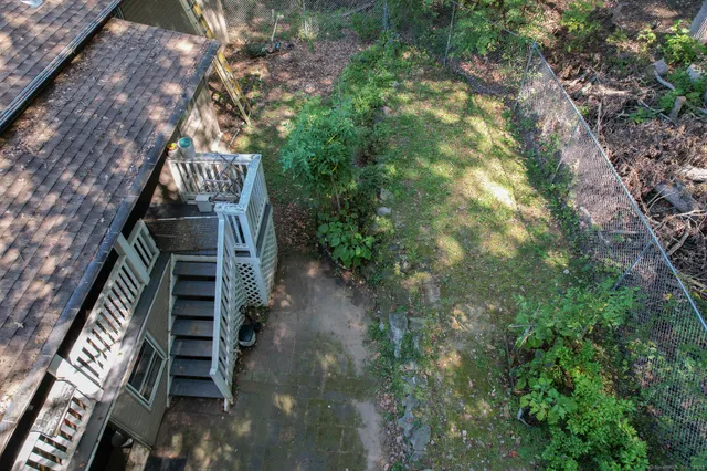 a view of stairs and yard