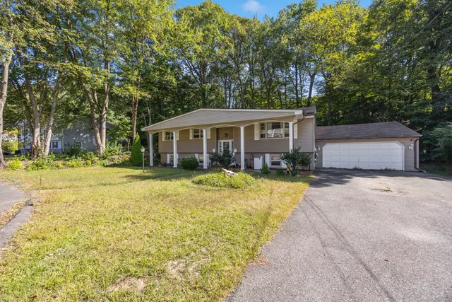 a view of a house with a swimming pool
