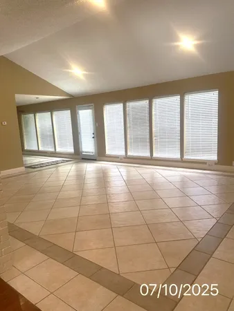 a view of a livingroom with wooden floor