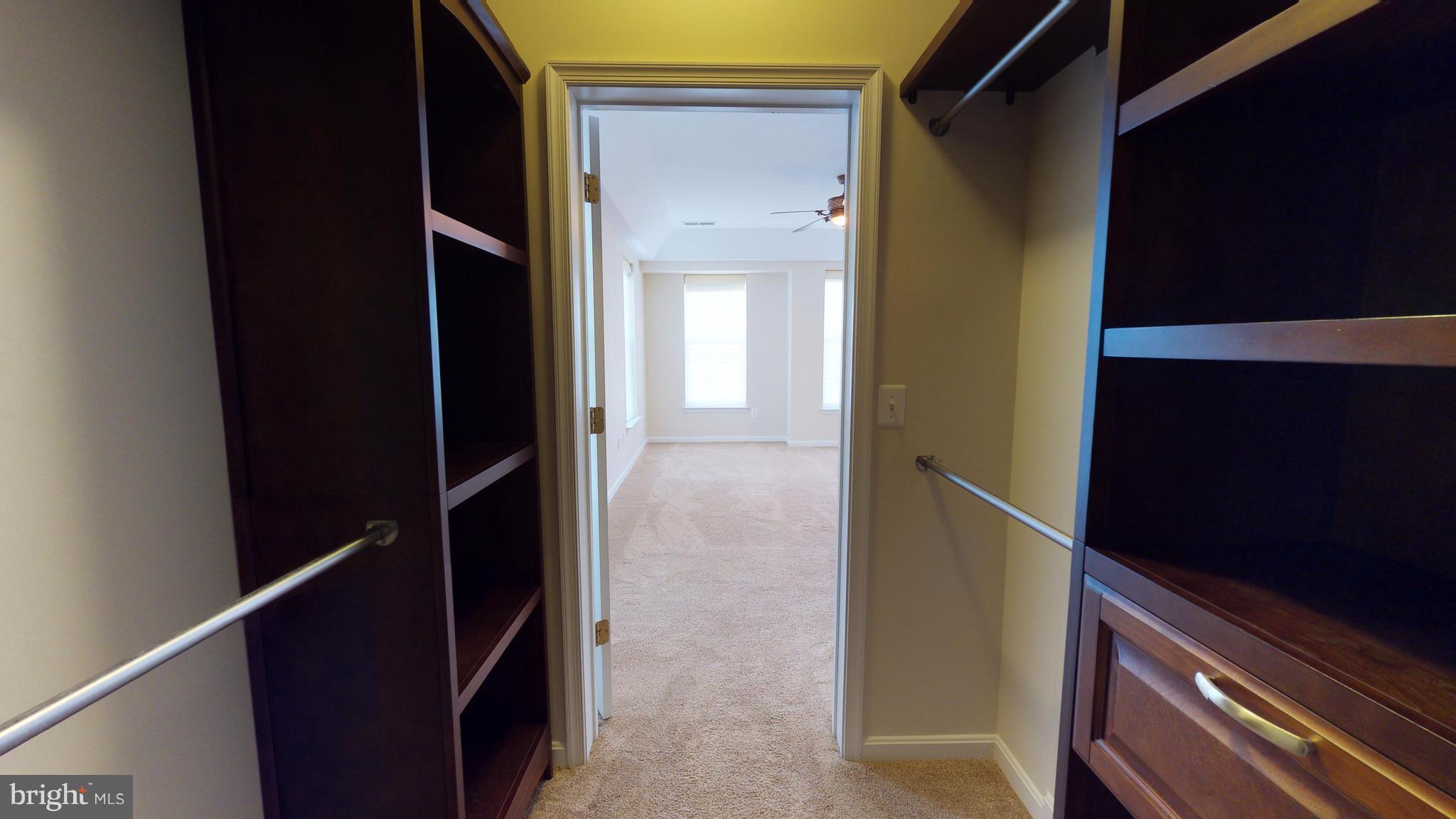 8601 Roaming Ridge Way, Unit 402 Odenton, MD 21113 - Photo 13 of 30 a view of closet