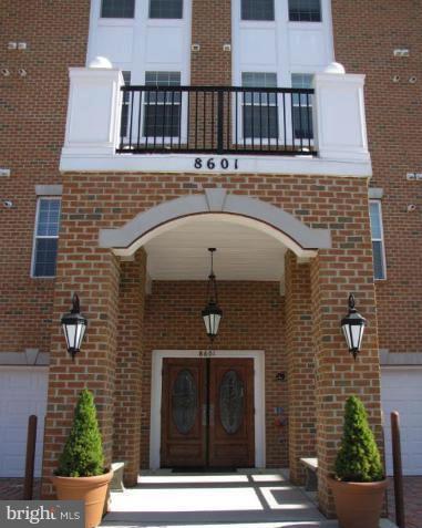 8601 Roaming Ridge Way, Unit 402 Odenton, MD 21113 - Photo 23 of 30 a front view of a house with a door