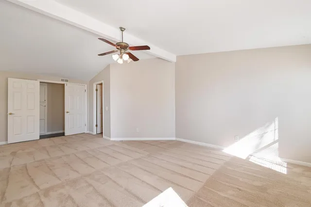 a view of backyard with a deck