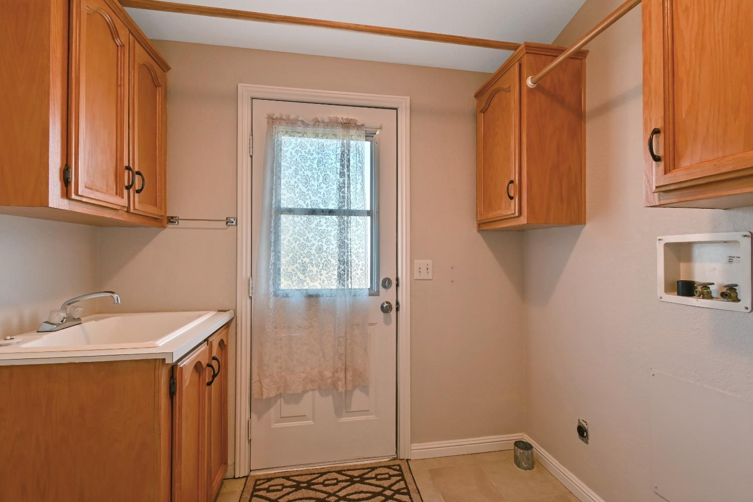 15655 County Road 45 Guinda, CA 95637 - Photo 22 of 66 a bathroom with a sink a toilet and shower