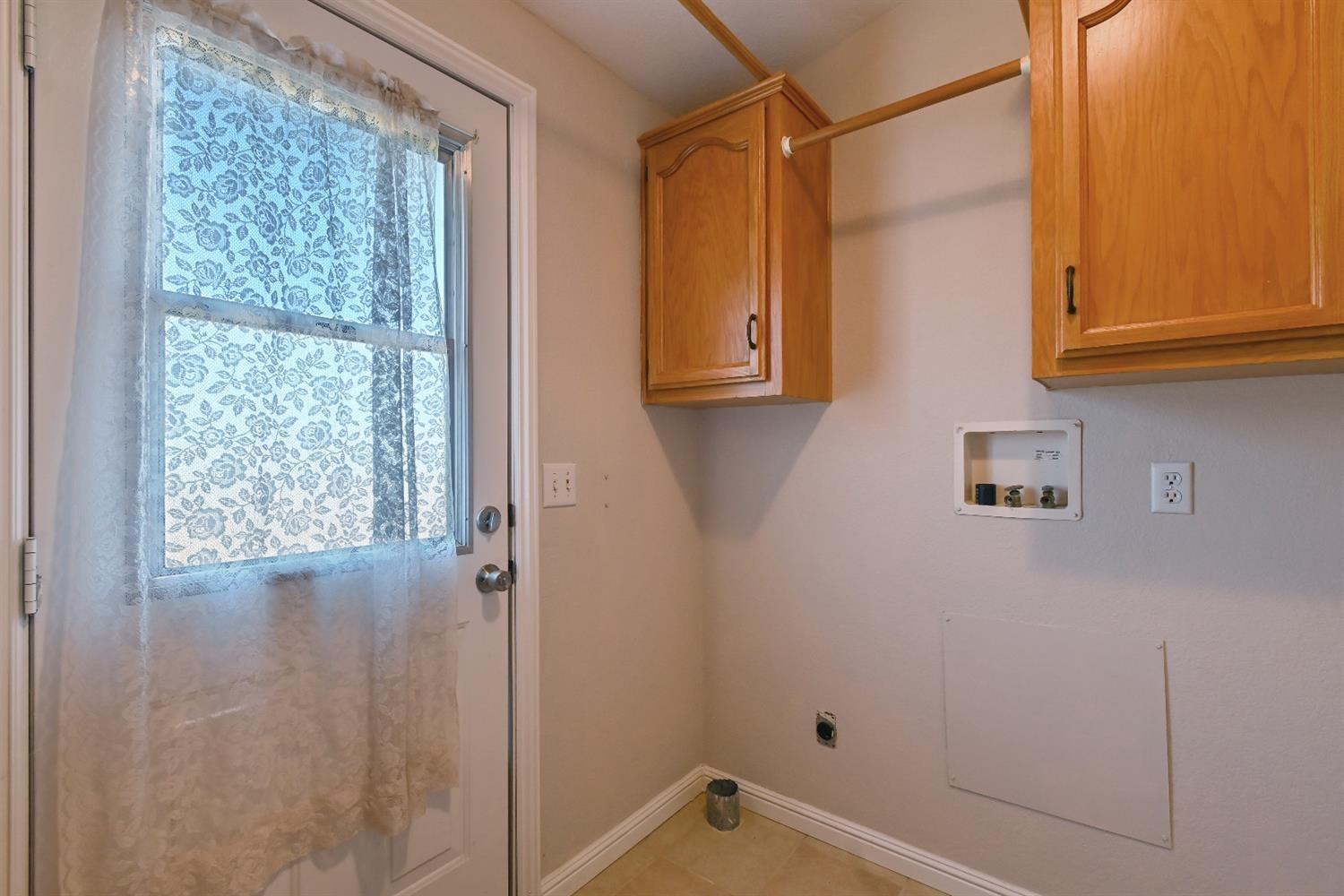 15655 County Road 45 Guinda, CA 95637 - Photo 23 of 66 a bathroom with a shower and a window