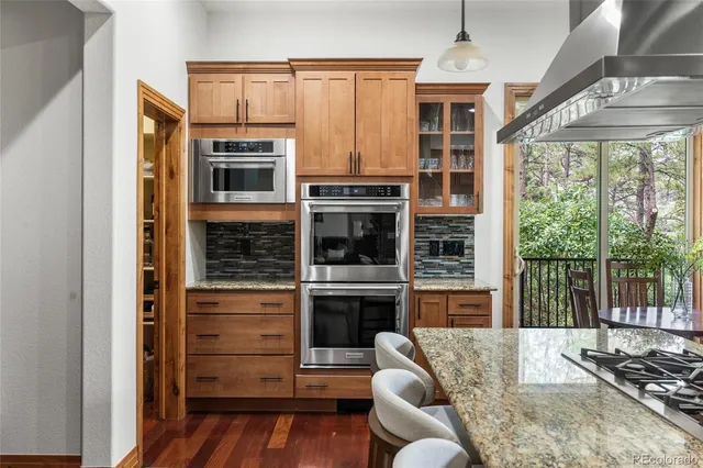 a living room with furniture fireplace and flat screen tv