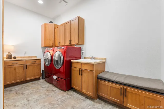 a view of a chairs and table on the wooden deck