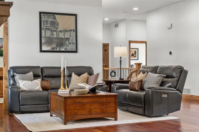 a living room with furniture and a couch