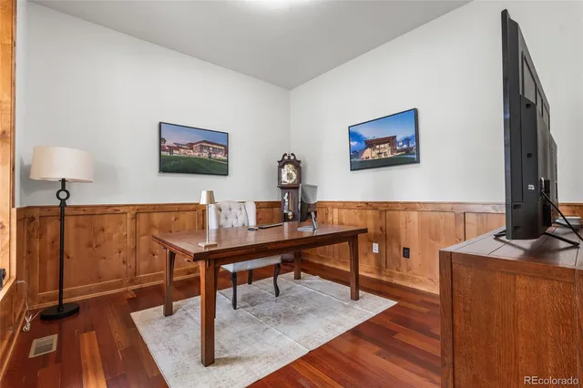 a view of a workspace with furniture