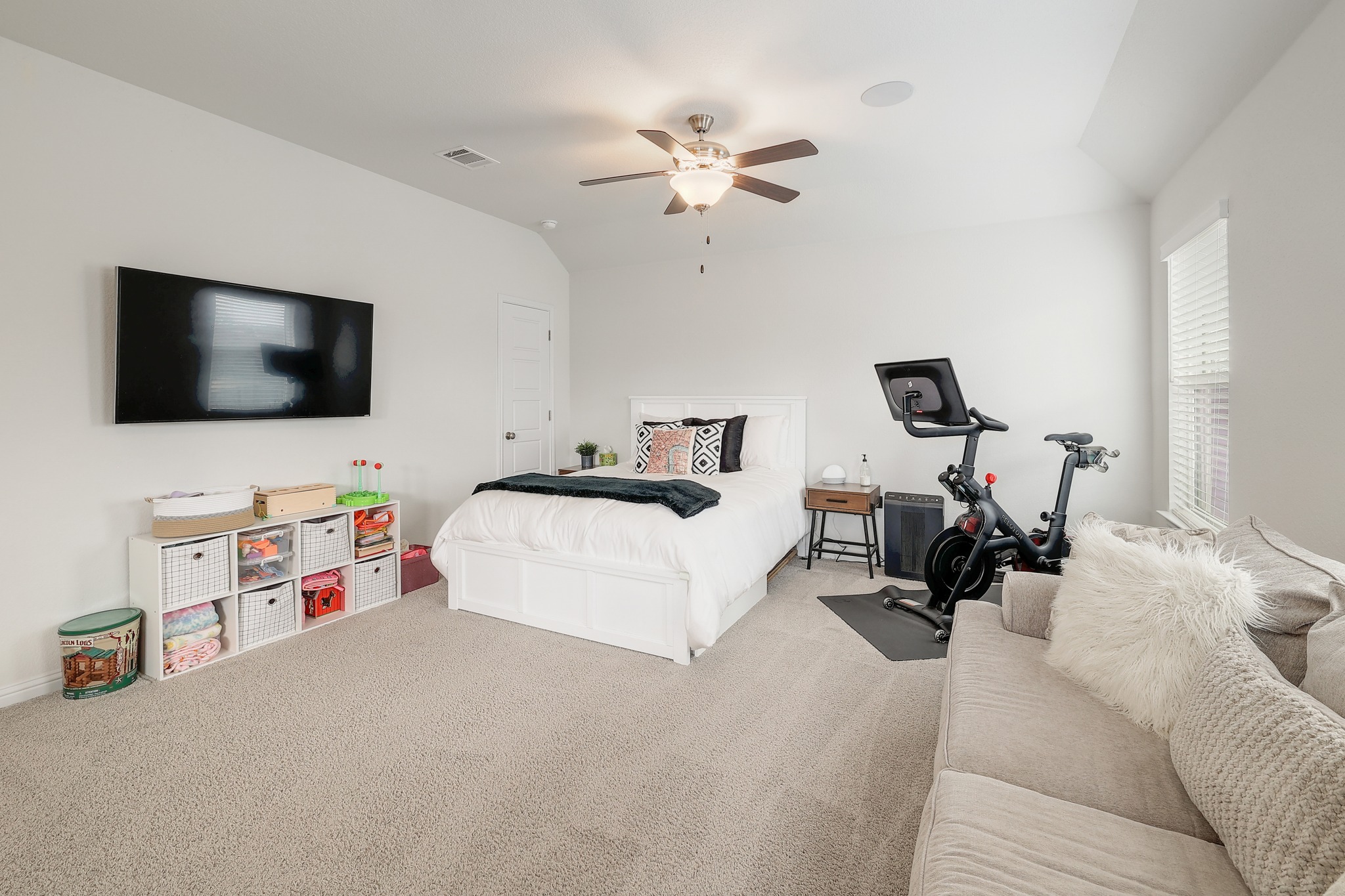 108 Argo Cove Georgetown, TX 78628 - Photo 26 of 36 Bedroom featuring vaulted ceiling, carpet flooring, and ceiling fan