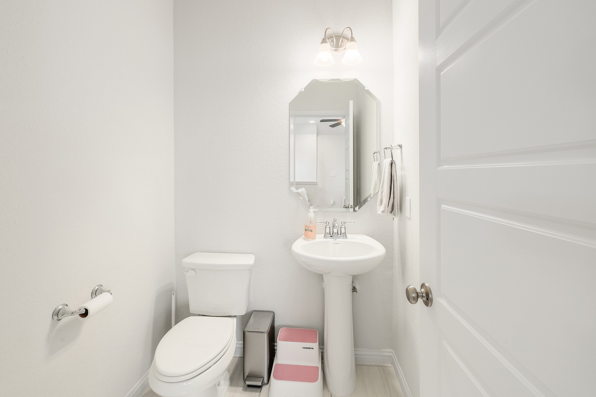 108 Argo Cove Georgetown, TX 78628 - Photo 27 of 36 Half bath with toilet and baseboards