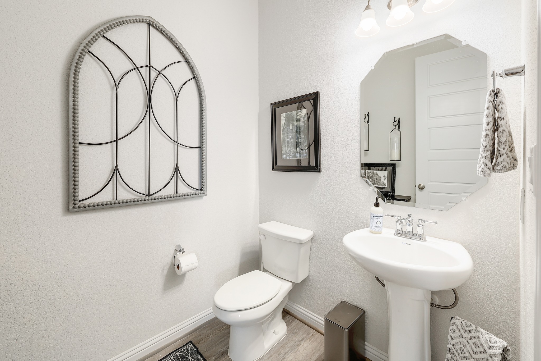 108 Argo Cove Georgetown, TX 78628 - Photo 28 of 36 Bathroom with toilet and wood finished floors