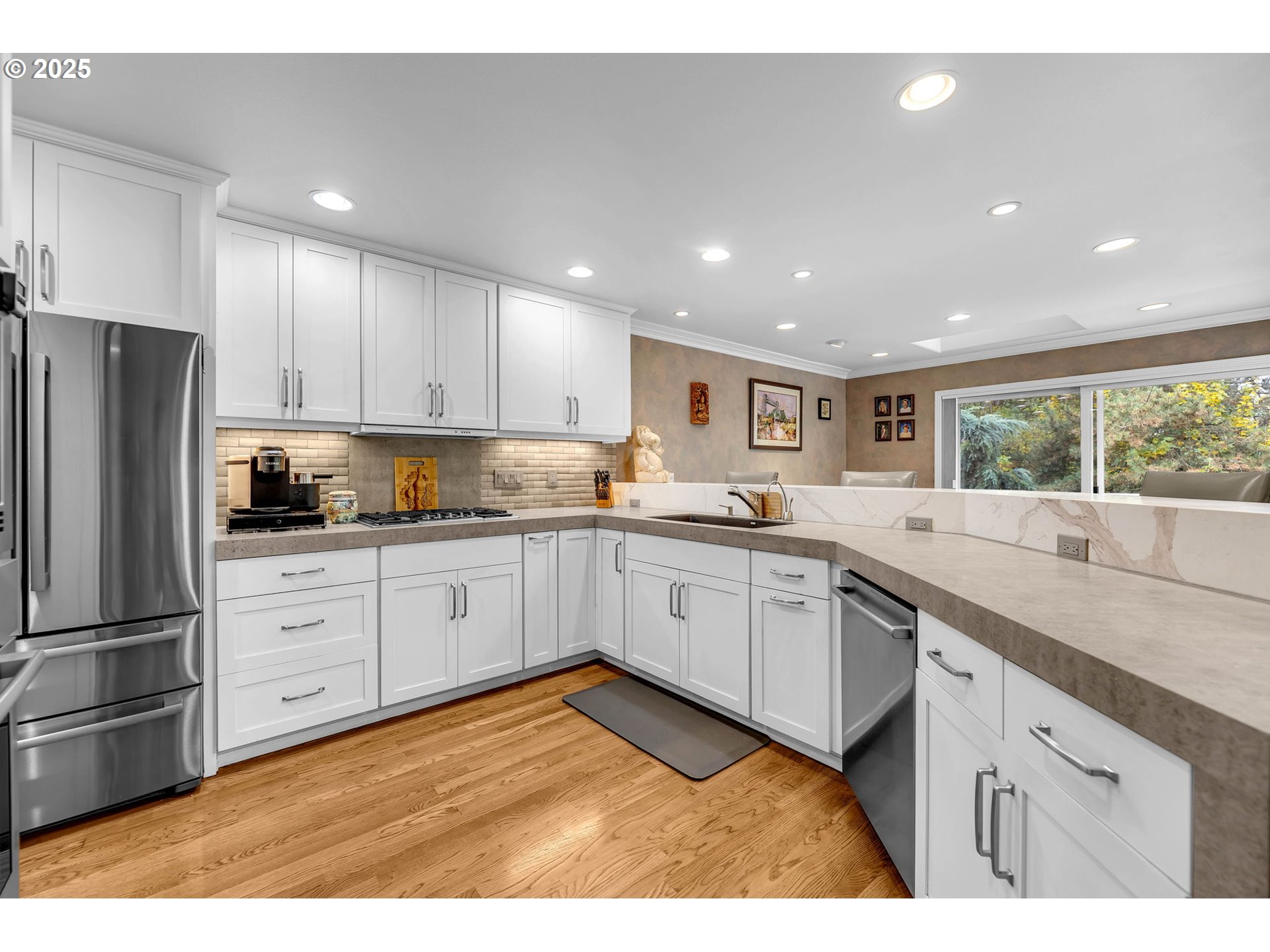3496 Chaparrel Loop West Linn, OR 97068 - Photo 13 of 41 a kitchen with a refrigerator sink and cabinets