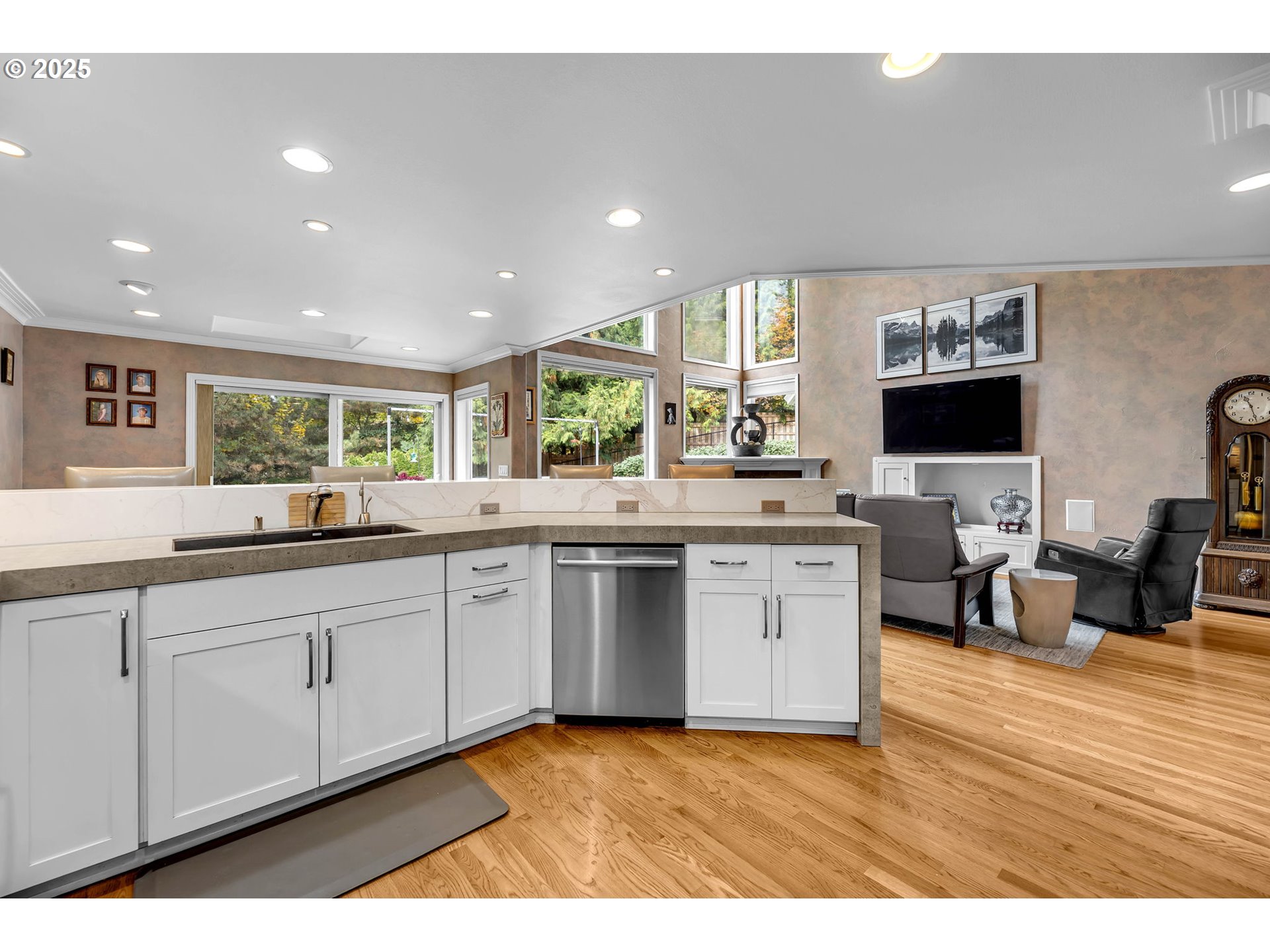 3496 Chaparrel Loop West Linn, OR 97068 - Photo 14 of 41 a kitchen with stainless steel appliances granite countertop a stove and a sink