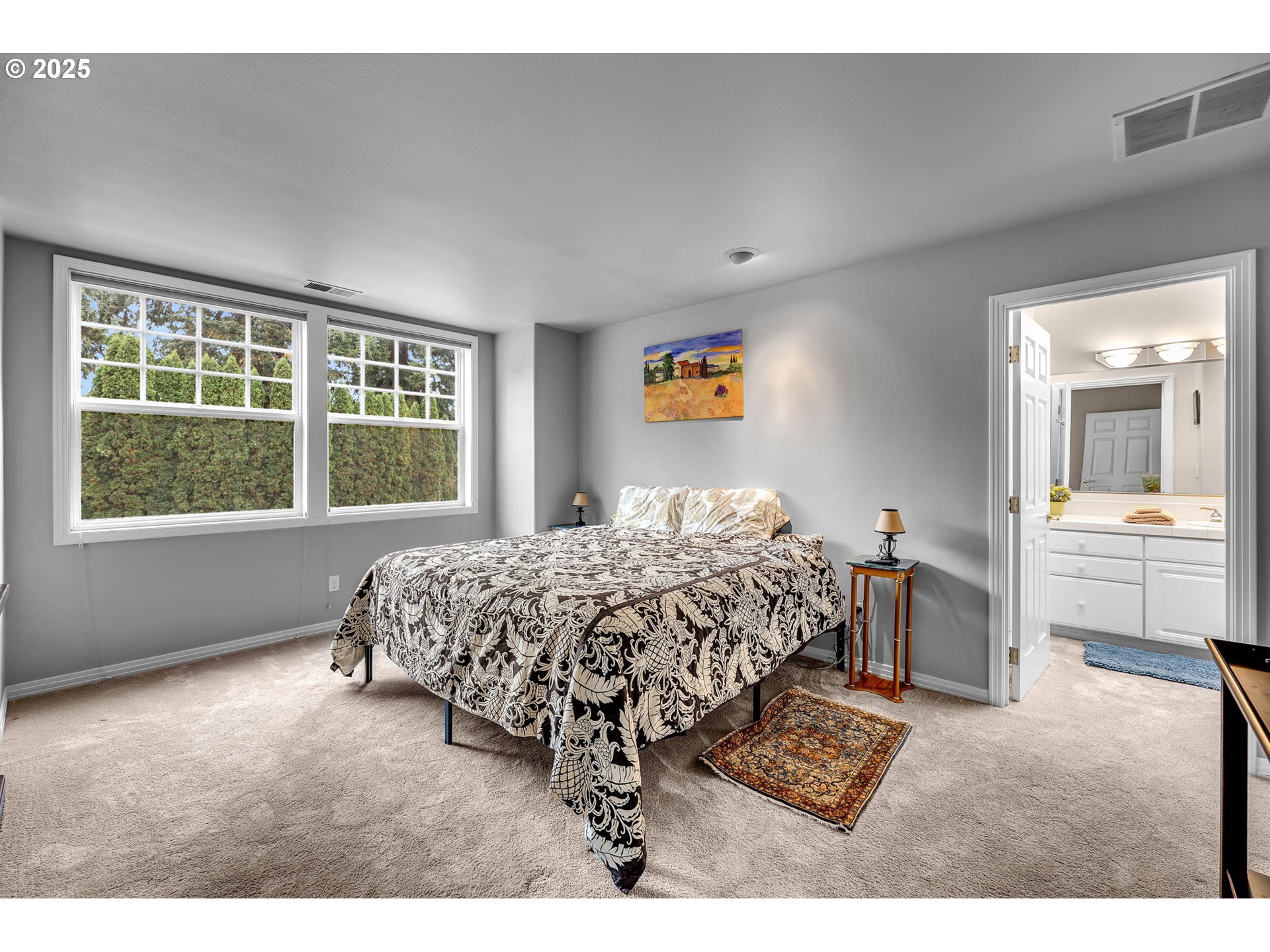 3496 Chaparrel Loop West Linn, OR 97068 - Photo 25 of 41 a bedroom with a bed and a window