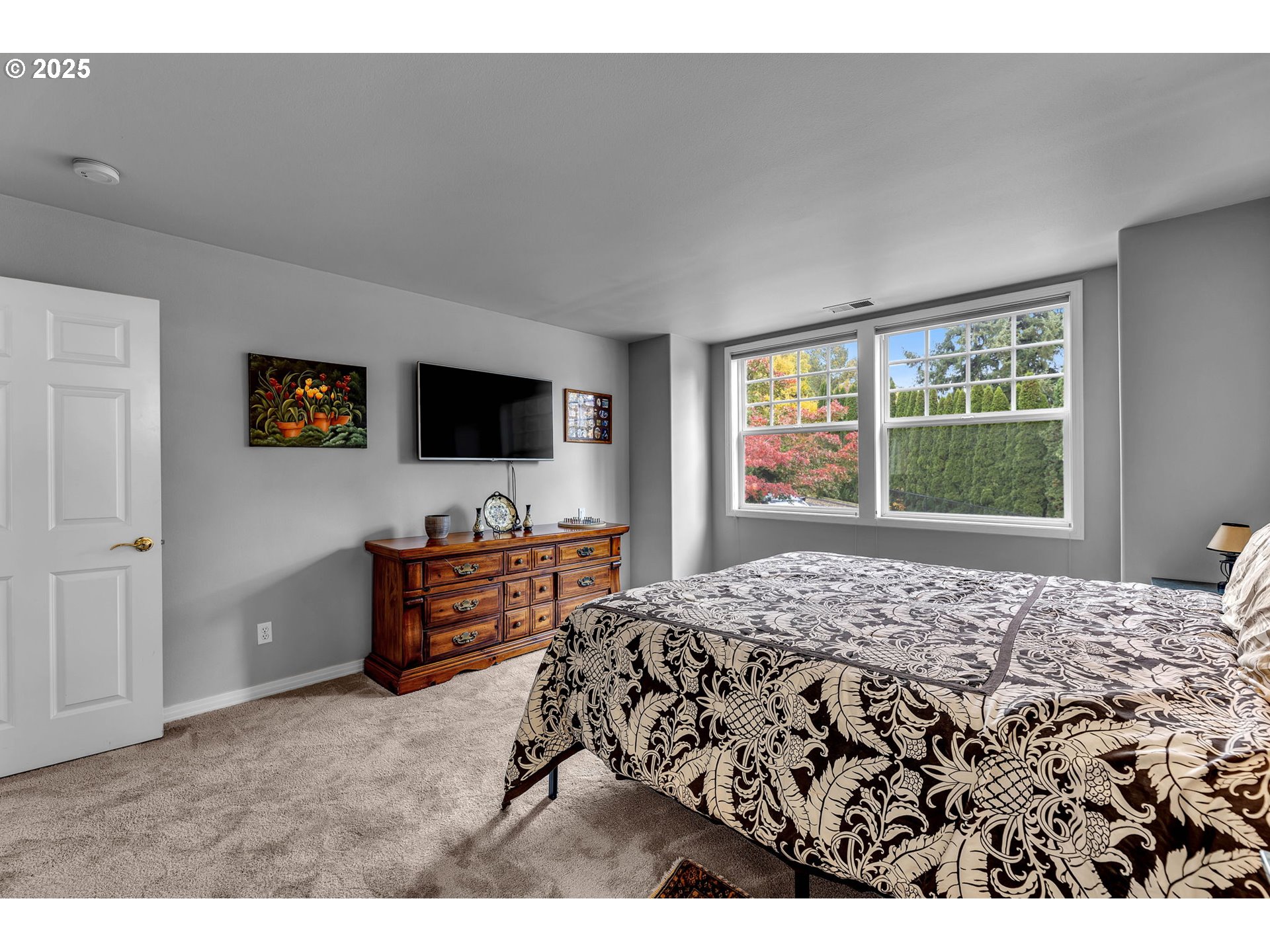 3496 Chaparrel Loop West Linn, OR 97068 - Photo 27 of 41 a bedroom with a bed and television