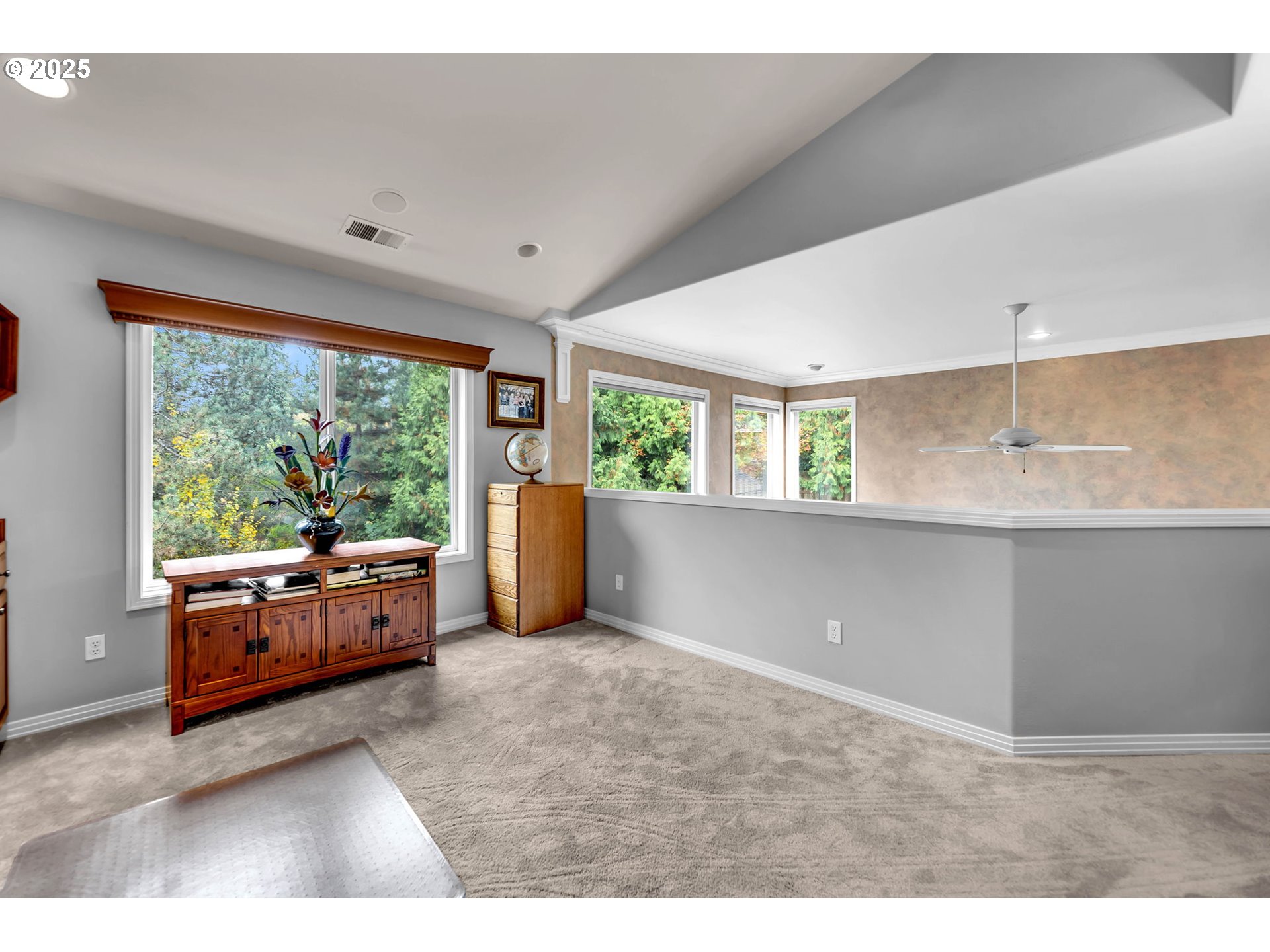 3496 Chaparrel Loop West Linn, OR 97068 - Photo 31 of 41 a living room with stainless steel appliances granite countertop furniture and a large window