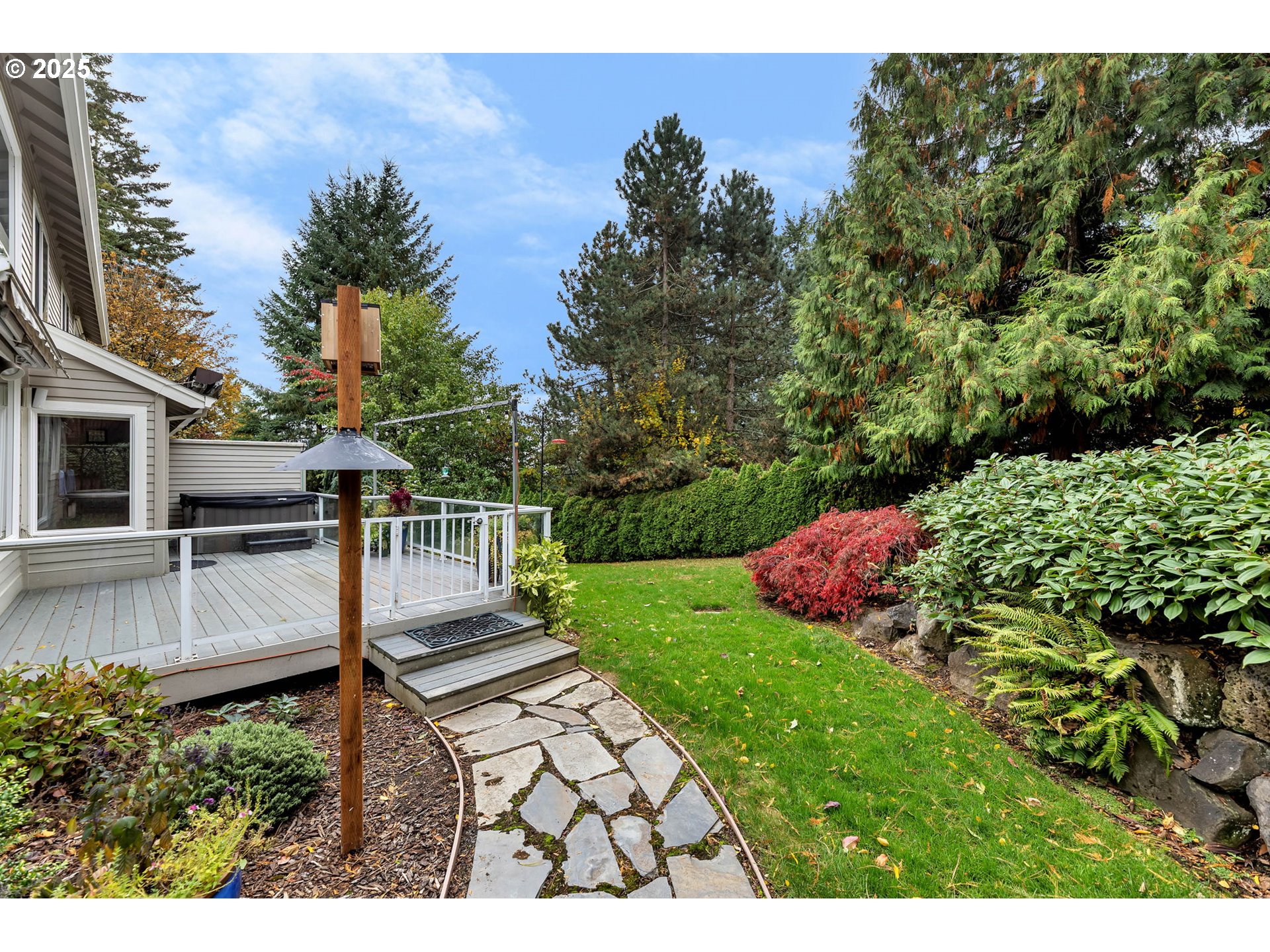 3496 Chaparrel Loop West Linn, OR 97068 - Photo 35 of 41 a view of a backyard with a garden