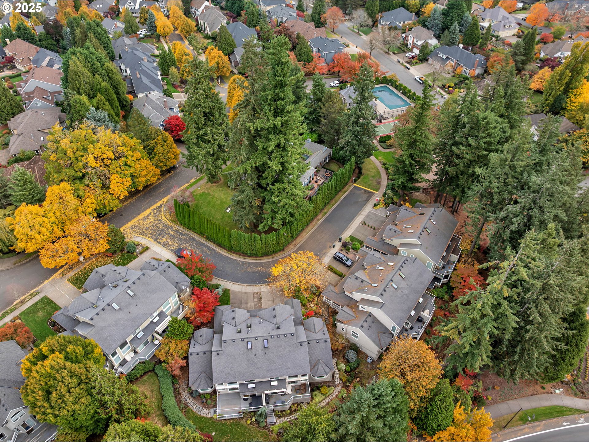 3496 Chaparrel Loop West Linn, OR 97068 - Photo 39 of 41 an aerial view of a house with a yard and garden
