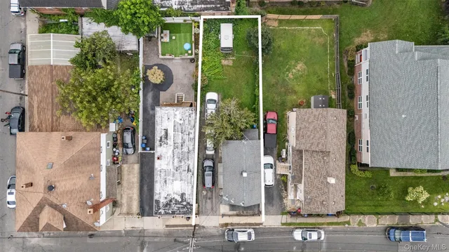 aerial view of a house with a garden and shower