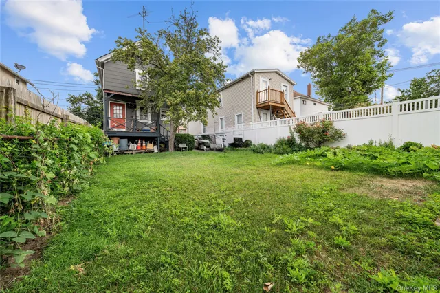 a view of a house with a back yard