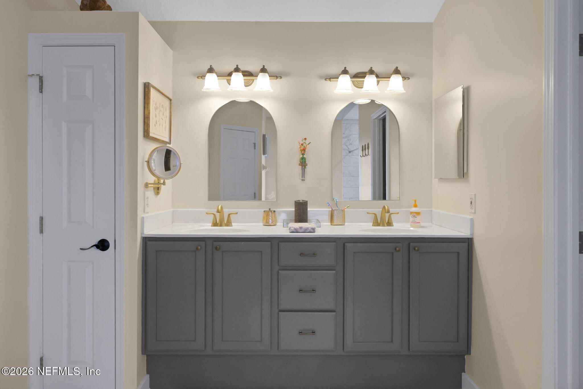 4320 Rye Court St. Johns, FL 32259 - Photo 33 of 60 a bathroom with double vanity sinks a toilet a double vanity and a mirror