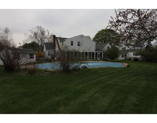 71 Florence Road Easthampton, MA 01027 - Photo 3 of 30 a view of a house next to a big yard with large trees