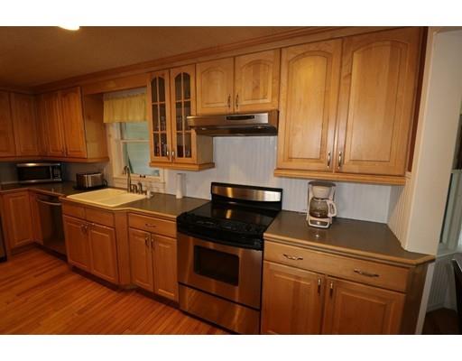 71 Florence Road Easthampton, MA 01027 - Photo 7 of 30 a kitchen with a sink a stove and cabinets
